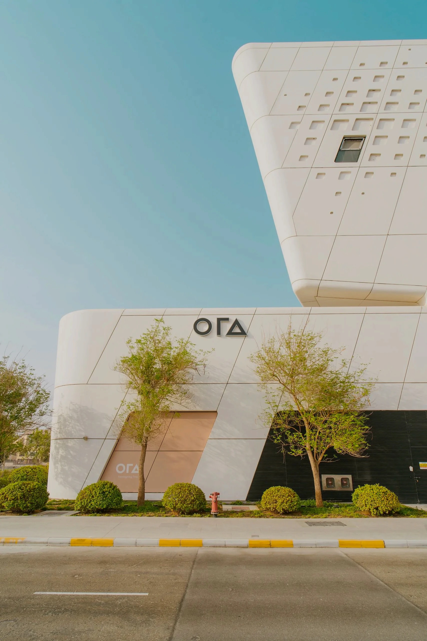 ORA Developments sales centre — white cantilevered facade