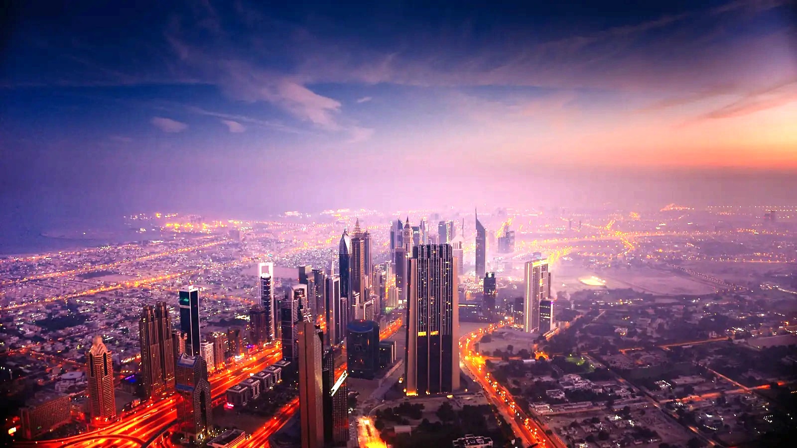 Dubai at dusk, seen from above Sheikh Zayed Road